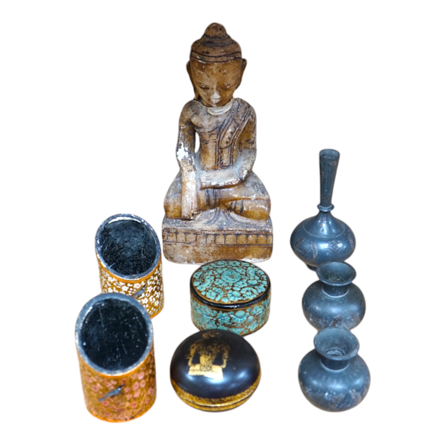 A collection of South East Asian and Indian collectables to include Bidri ware, alabaster Buddha and four papier mache pots, largest 26cm high. Condition - mostly fair